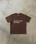 NEVER STOP PLAYING TEE